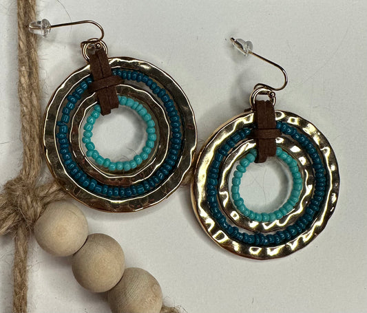 Gold/teal circle